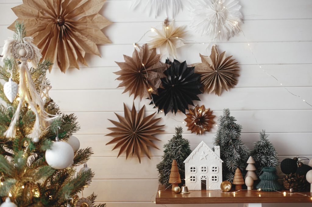 Christmas tree, little house, fir, lights, stars. Modern holida decor.