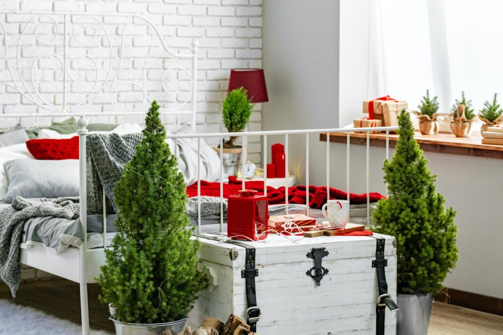 Modern bedroom interior decorated red for Christmas